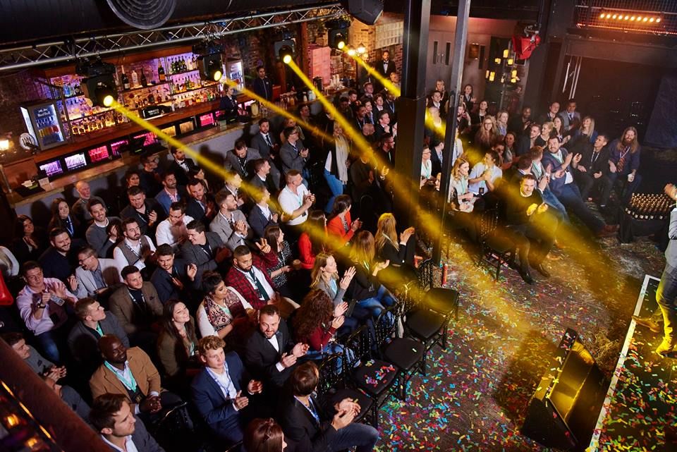 Vibrant event space at Egg LDN with engaged audience, ideal for networking and entertainment. - Banner