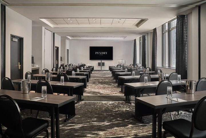 Chateau Carbide Rooftop meeting room with natural light for corporate events and seminars.