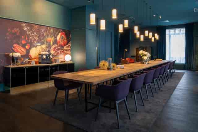 Sophisticated meeting space in Renaissance Brussels Hotel, ideal for corporate events.