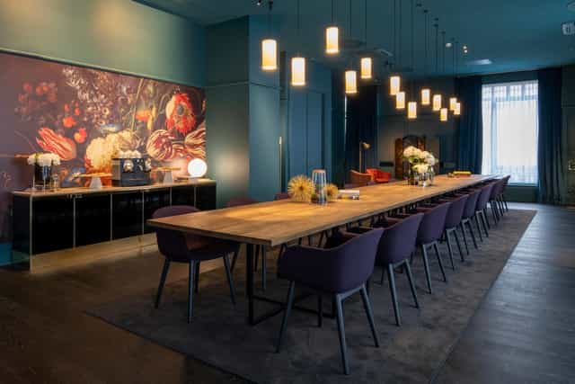Sophisticated meeting space in Renaissance Brussels Hotel, ideal for corporate events.
