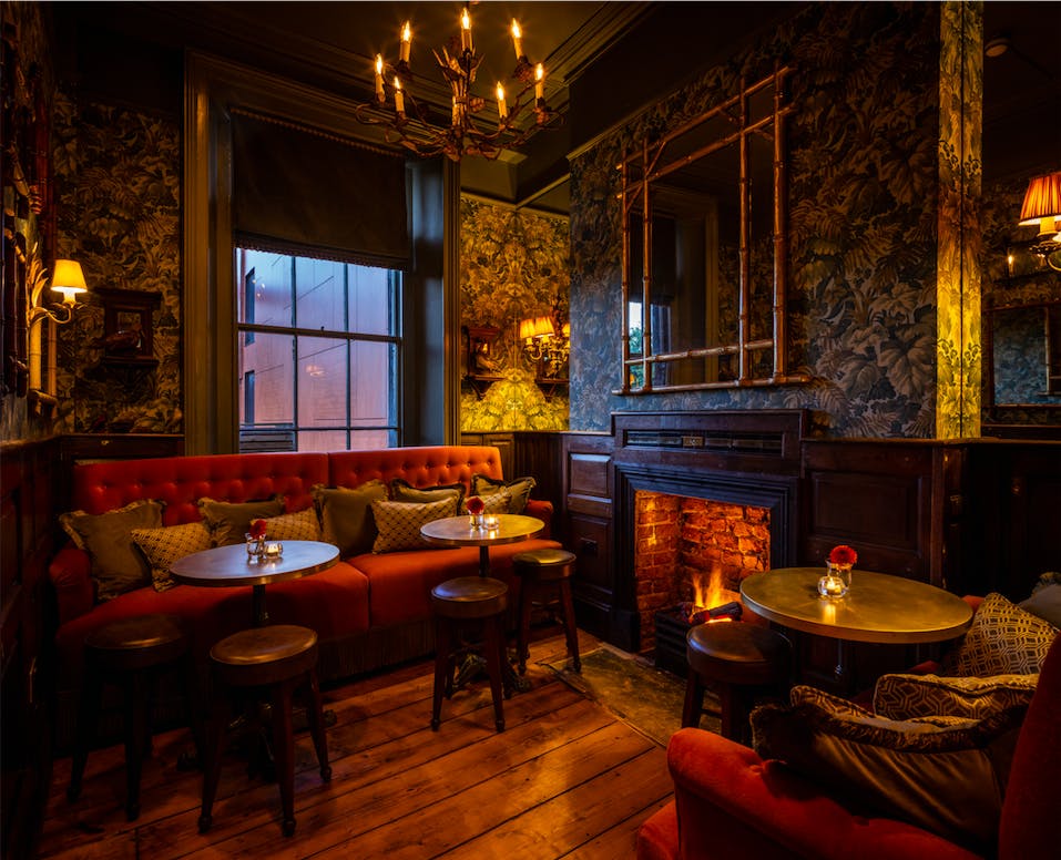 Cozy Cocktail Lounge with plush seating, ideal for networking events and gatherings.