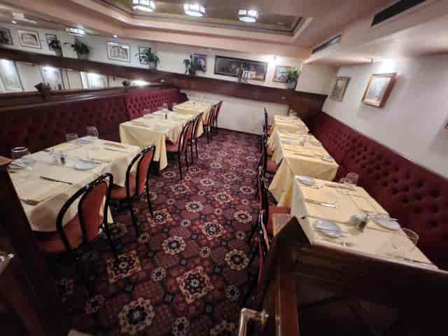 Semi-private dining area in Bolton's Restaurant, ideal for intimate meetings and events.