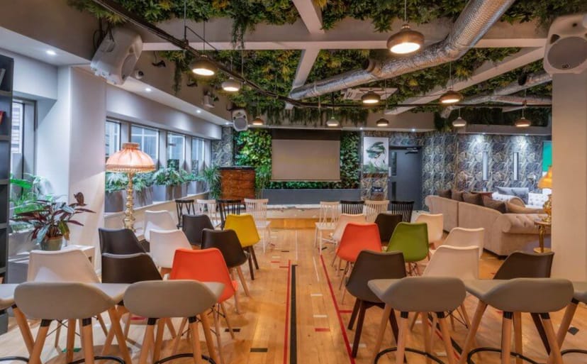 Main Lounge in Arboretum London, colorful chairs for networking and presentations.