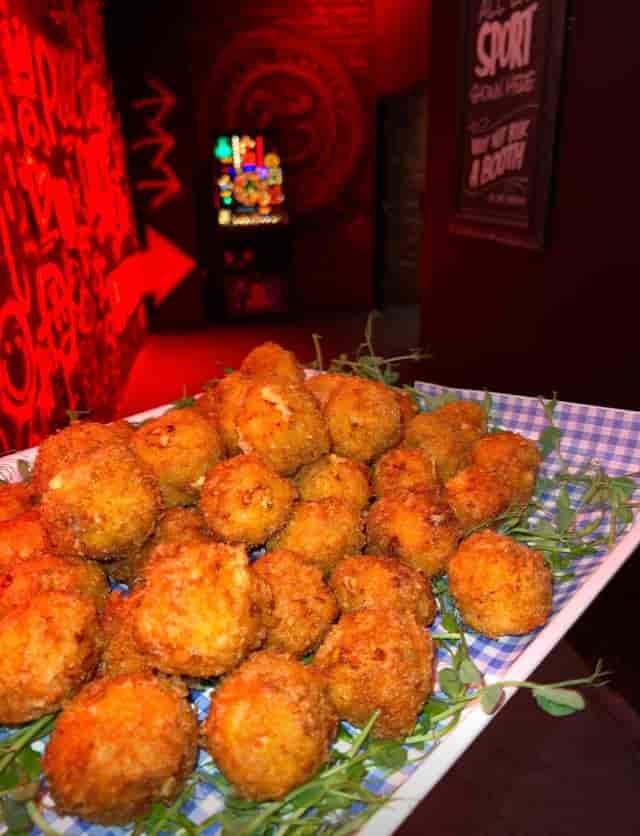 Vibrant platter of crispy appetizers at The Lost Weekend, ideal for networking events.