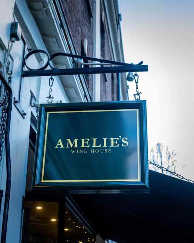 Amelie's Wine House sign, elegant venue for wine tastings and private events.