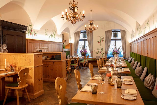 Elegant dining space at Weinhaus Neuner for intimate gatherings and corporate events.
