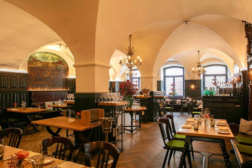 Elegant restaurant venue with arched ceilings for corporate events and gatherings.