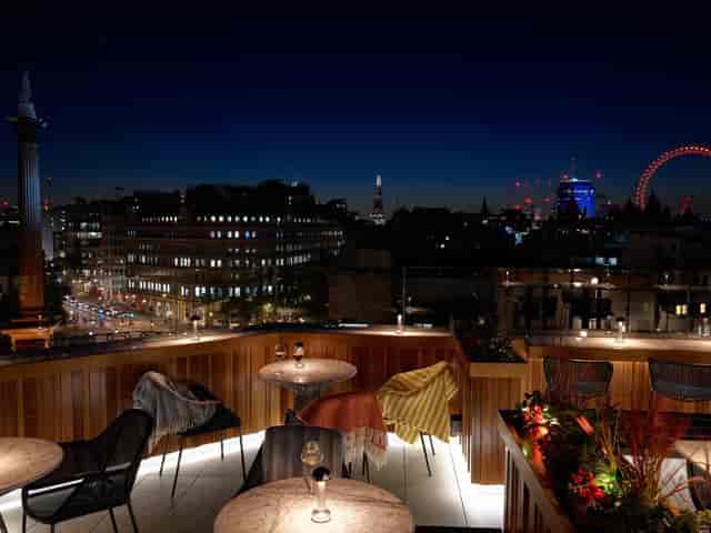 Rooftop Gallery at Trafalgar St James, stylish seating, perfect for cocktail receptions.