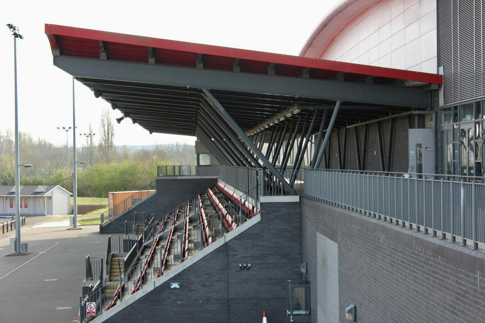 Athletics Track in Basildon: modern venue with tiered seating for events and gatherings.