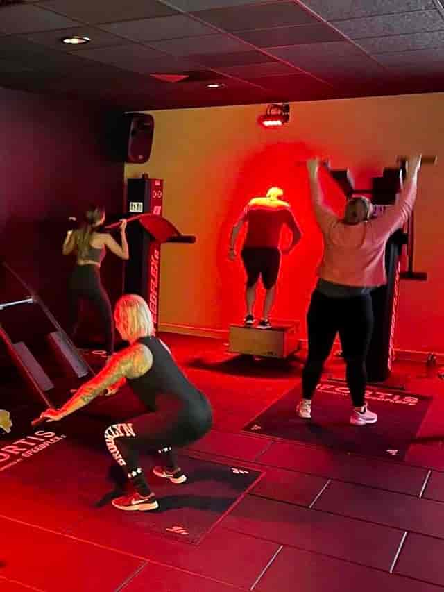 Dynamic fitness class at Basildon Sporting Village, promoting teamwork and wellness.
