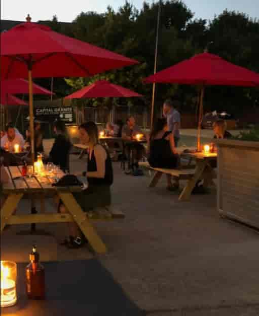 Outdoor dining setup at Renegade Urban Winery, ideal for casual networking events.