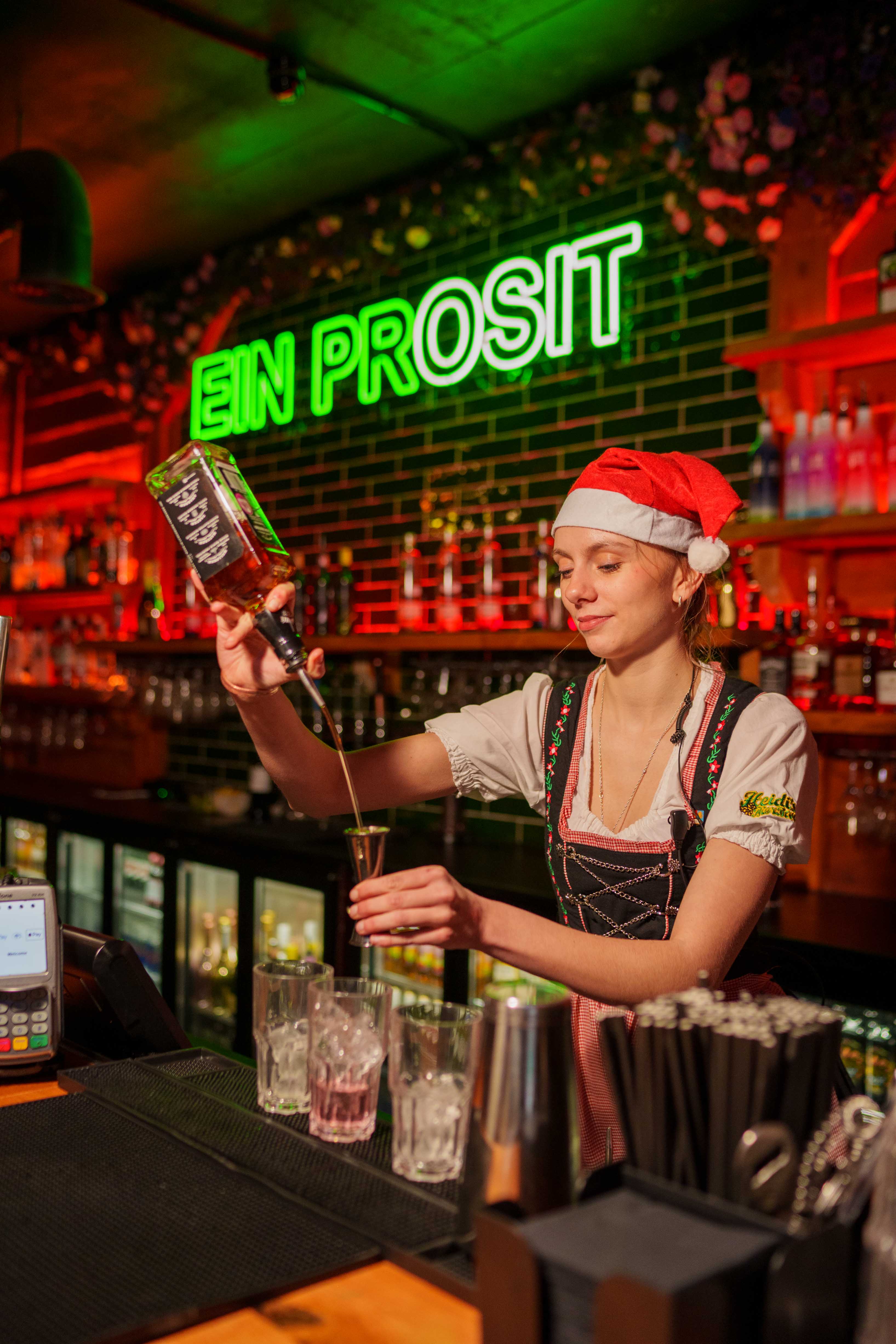 Festive bar scene at Barbara's Bier Haus, perfect for holiday parties and gatherings. - Banner