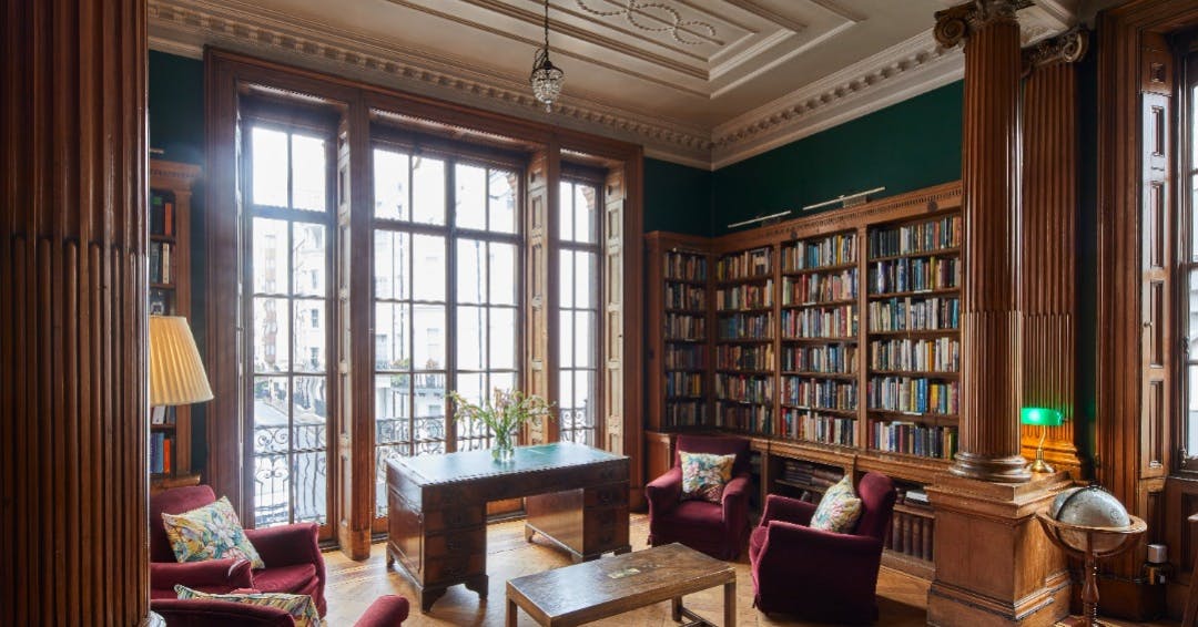 Elegant meeting space with natural light at University Women's Club for workshops and meetings.