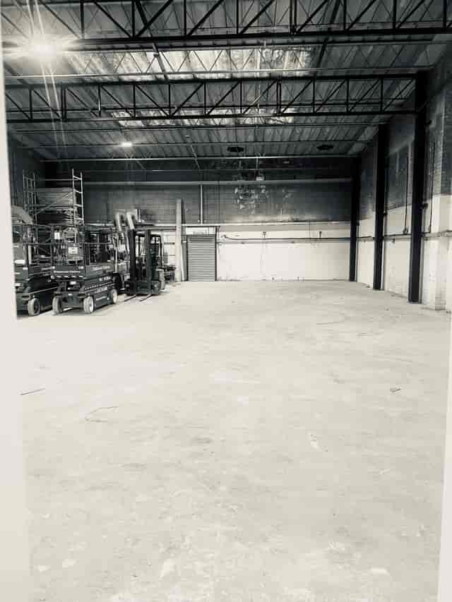 Spacious industrial venue at Dragon Smoke Studios for events and exhibitions.