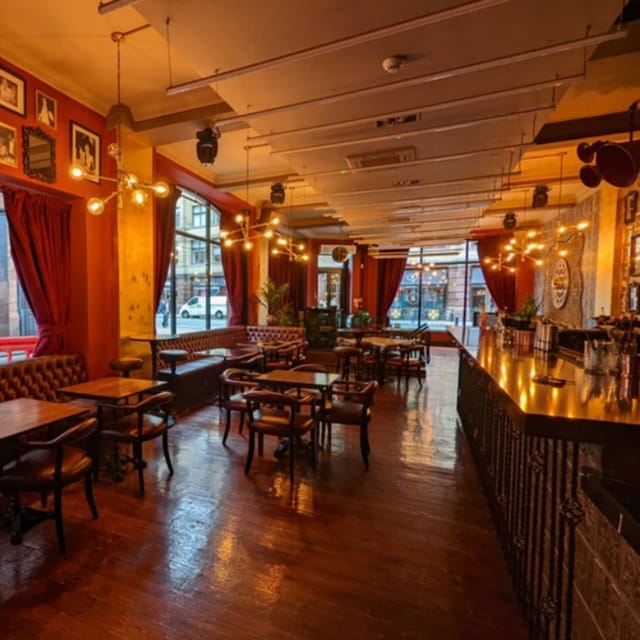 Stylish venue with warm lighting, ideal for cocktail receptions and networking events.