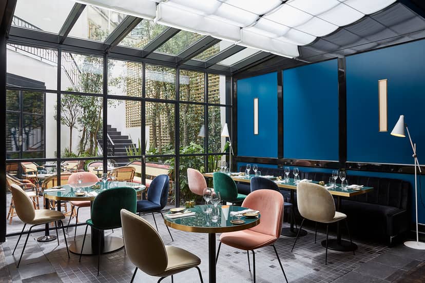 Stylish Le Roch Hotel restaurant with glass walls, ideal for upscale events and private dinners.