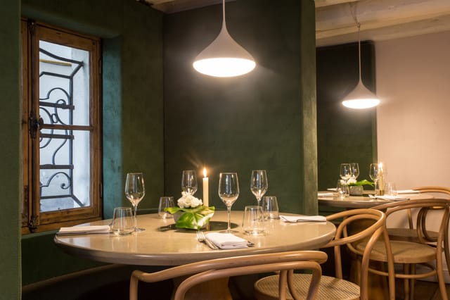 Intimate dining setup in Jardin Room, GrandCoeur for private events and networking dinners.