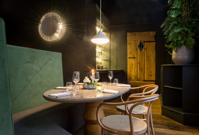 Intimate dining space in Jardin Room, GrandCoeur for private events and meetings.