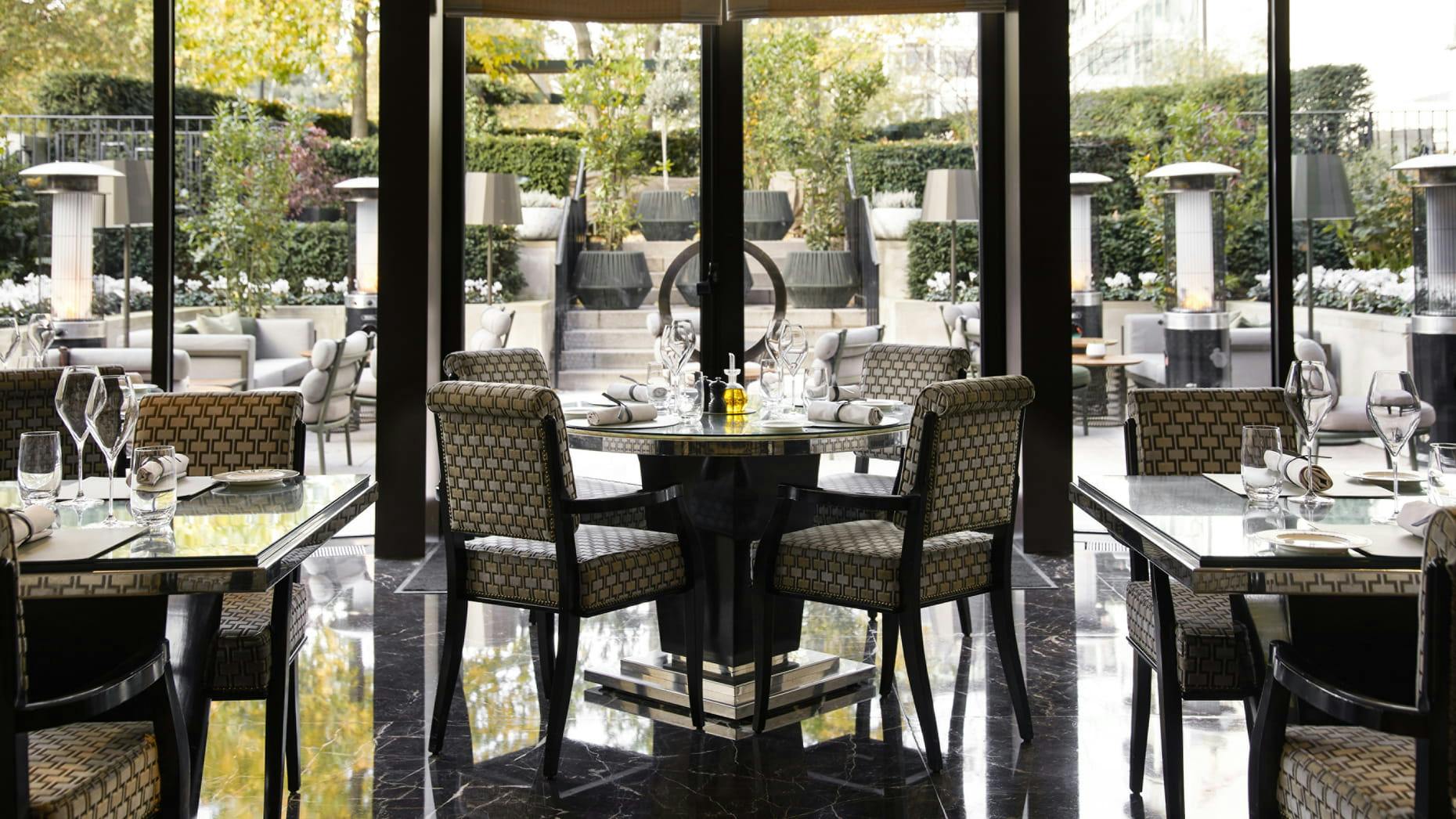 Elegant dining space at Four Seasons Hotel London, perfect for upscale events and meetings.