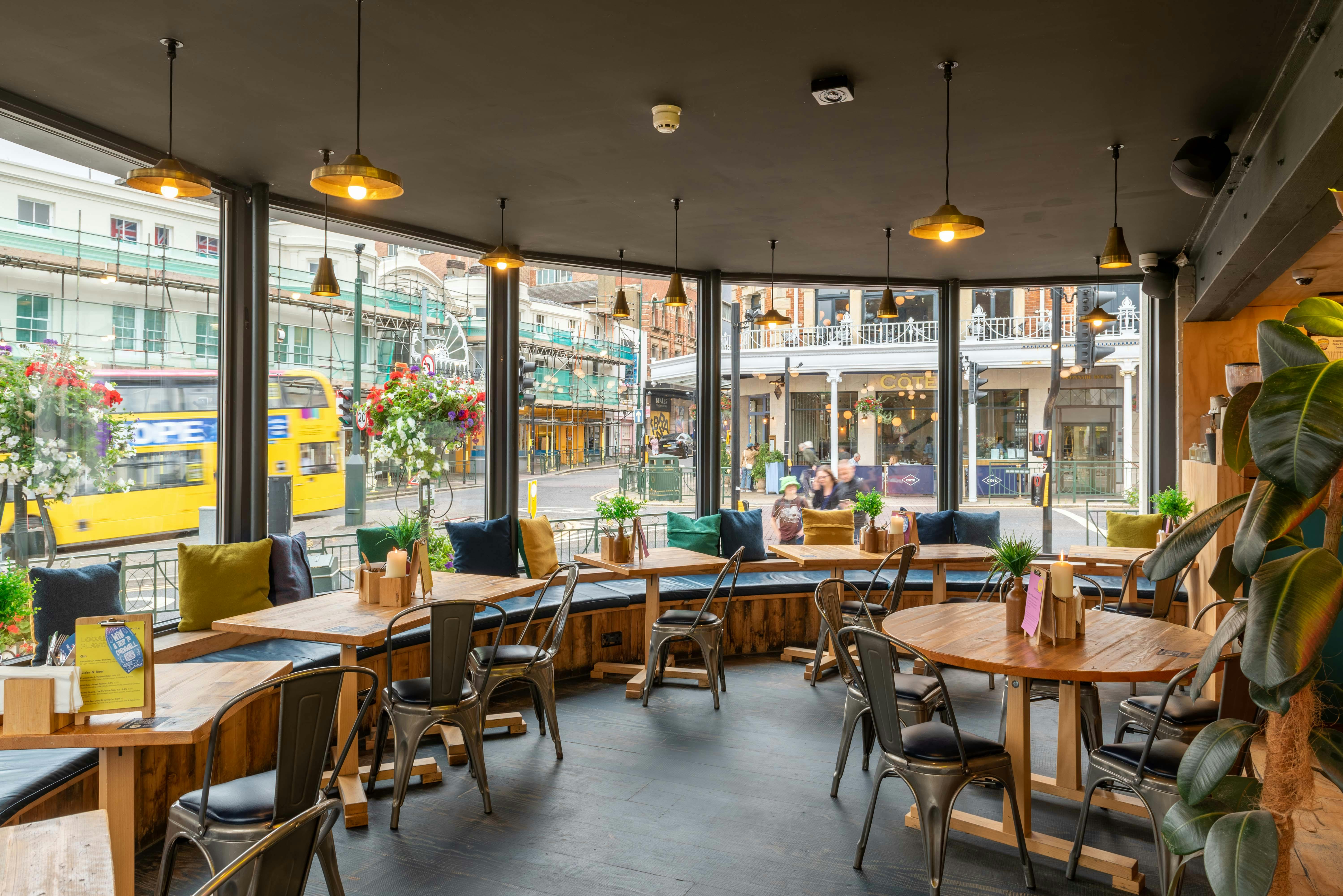 Stylish venue hire in Bournemouth with large windows, ideal for casual meetings and events.