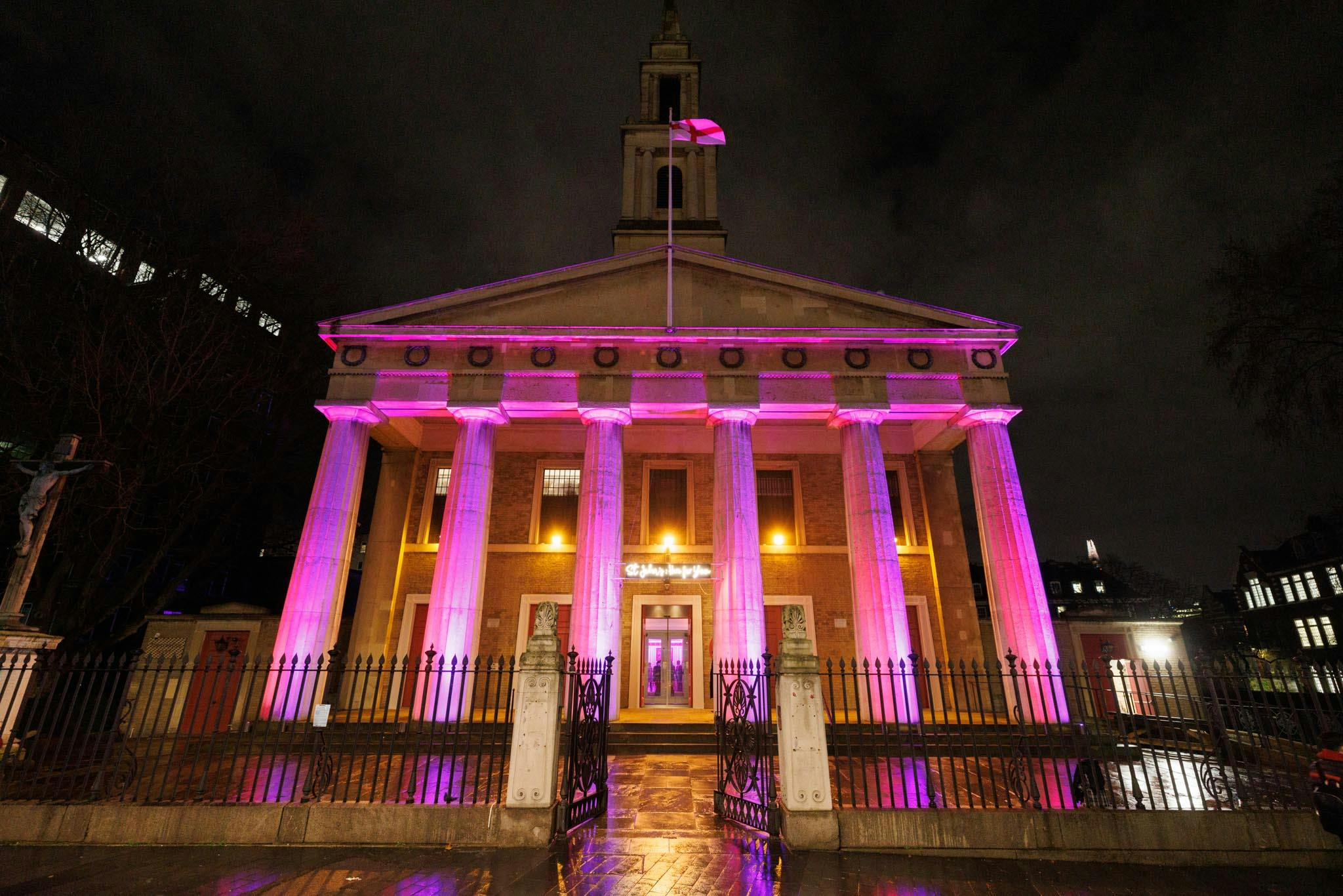 Illuminated Old Crypt venue with pink lighting, ideal for upscale evening events.