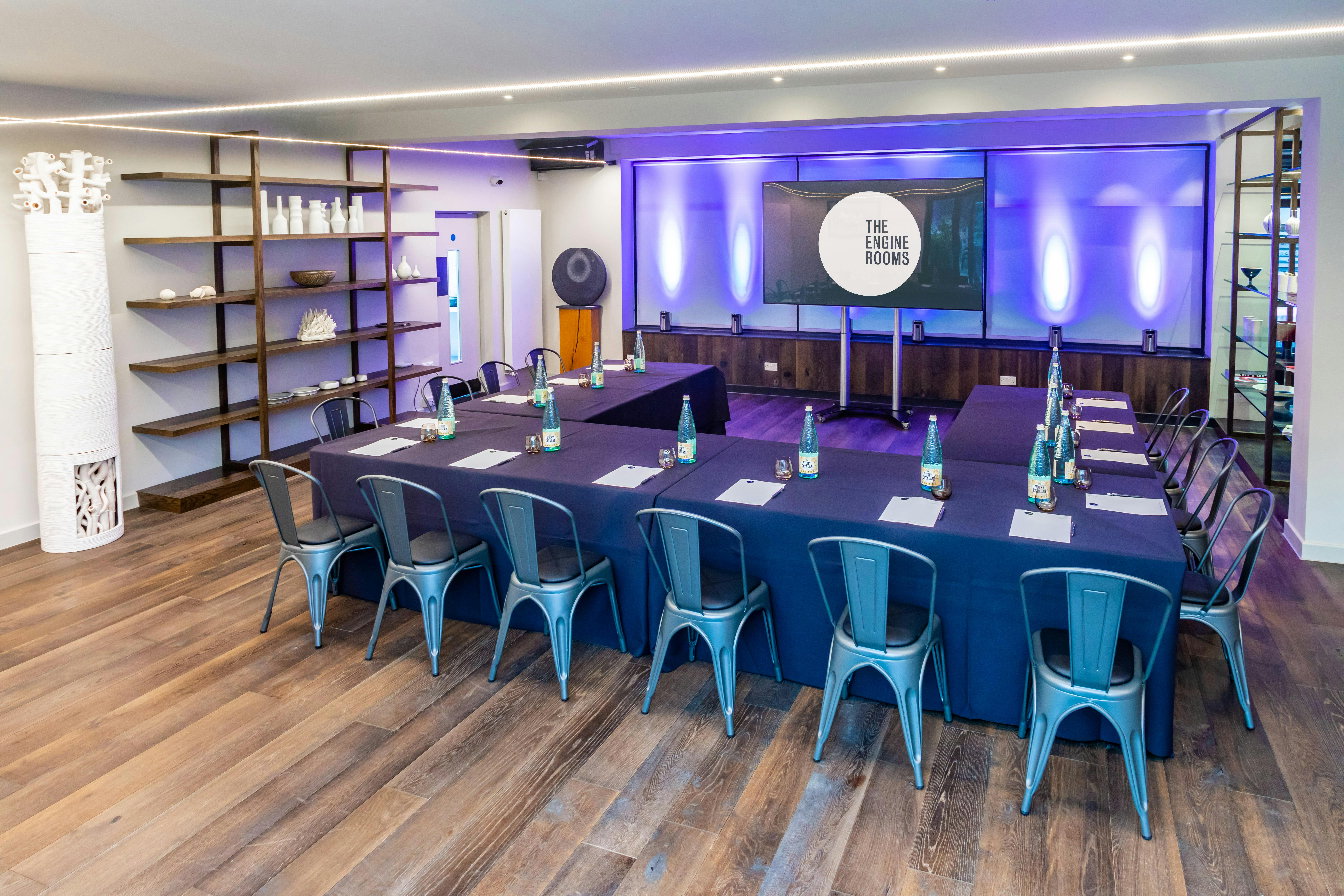 V8 & V12 Rooms Combined: modern meeting space with long table for professional events.