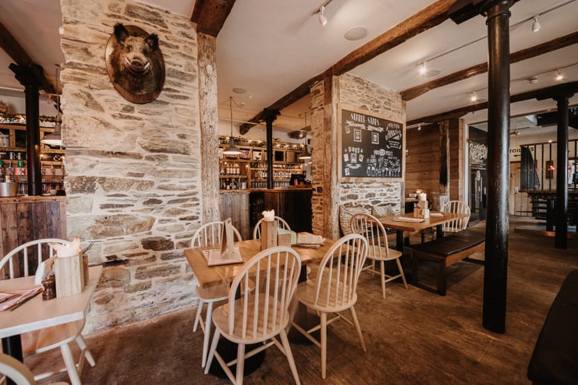 Rustic venue hire at The Falmouth Stable, ideal for casual meetings and small events.