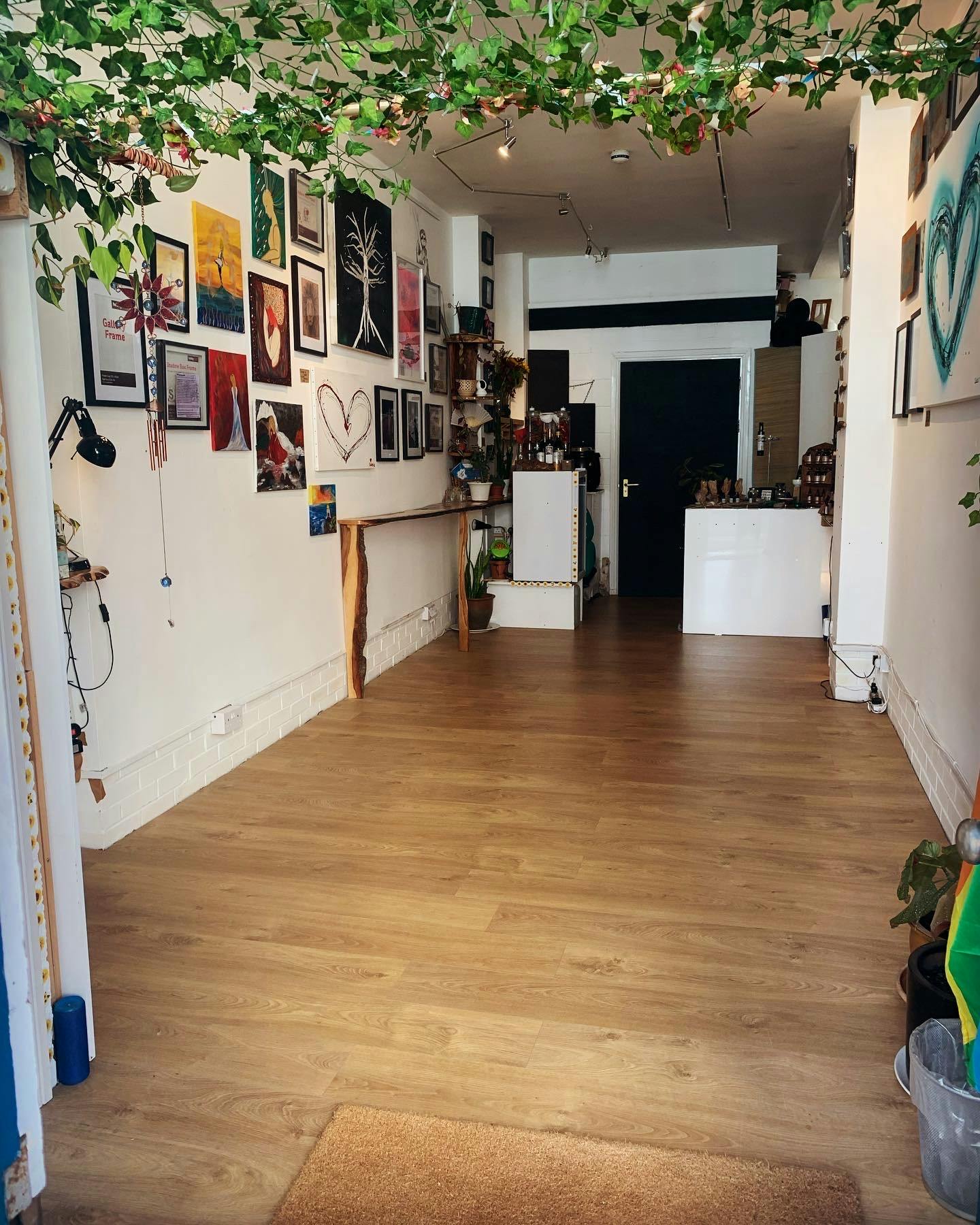 Versatile event space with wooden flooring, ideal for workshops and meetings.