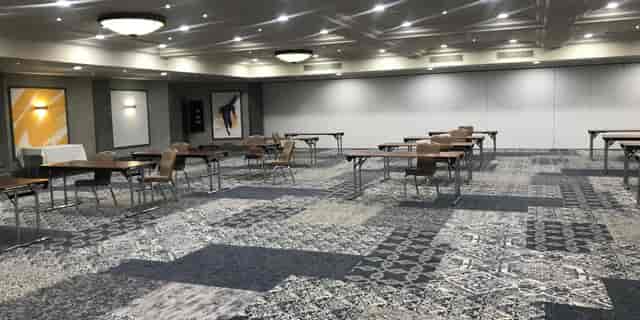 Versatile meeting space at voco St. John's Solihull, perfect for workshops and conferences.