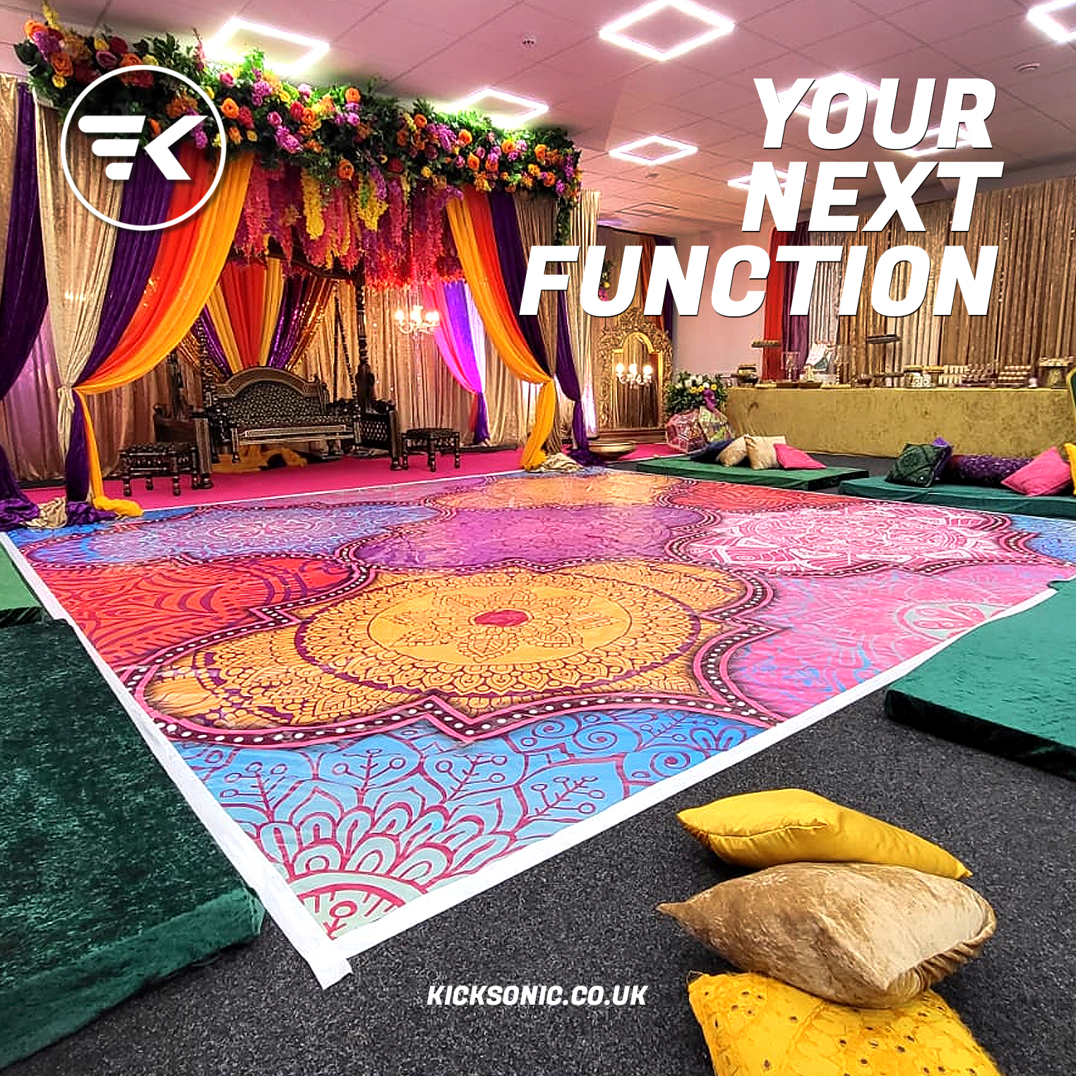 Vibrant event setup with intricate floor design for cultural celebrations or weddings. - Banner