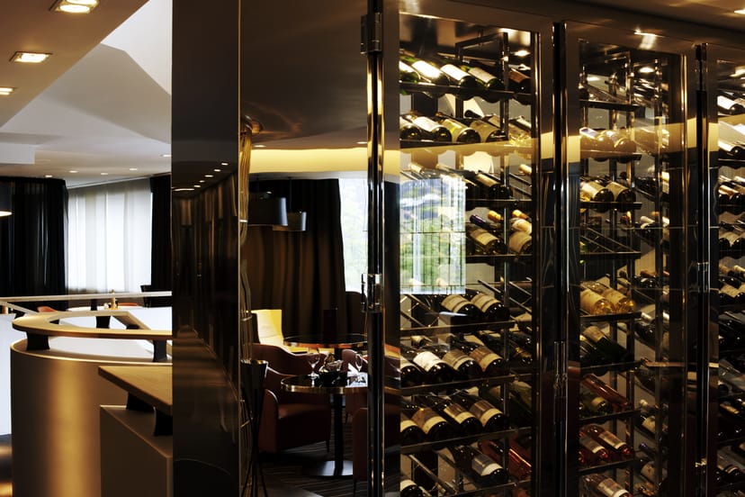 Sophisticated wine display in Pullman Brussels Centre Midi for upscale events and meetings.