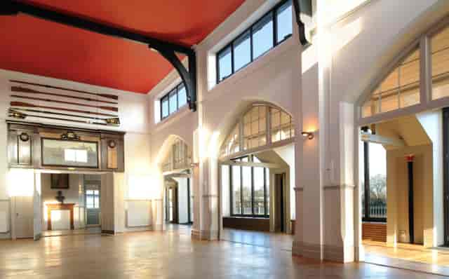 Great Hall at Thames Rowing Club with red ceiling, ideal for corporate and social events.