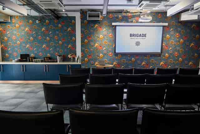 Covent Garden meeting space with floral wallpaper, ideal for presentations and brainstorming.