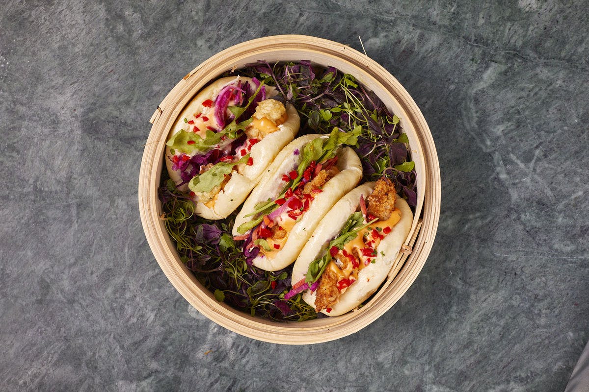 Colorful bao buns with fresh greens for events and catering in Sican.