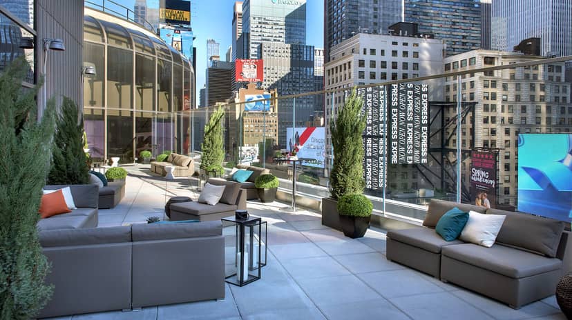 Stylish outdoor event space at Marriott Marquis with modern seating for cocktail receptions.