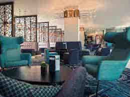 Aspen Room lounge at Bristol Holland House, stylish seating for networking events.