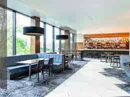 Aspen Room at Bristol Holland House: modern venue with natural light for events and meetings.