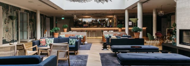 Stylish Wintergarden lounge at St Georges Hotel, ideal for networking and meetings.