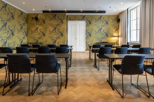 Modern meeting room at Scandic Gran Central, perfect for workshops and conferences.