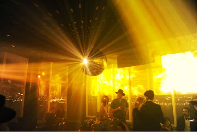 Vibrant event space at The Standard with disco ball, perfect for upscale parties and networking.