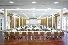 Ballroom at Falkenstein Grand, U-shaped tables for conferences and workshops.