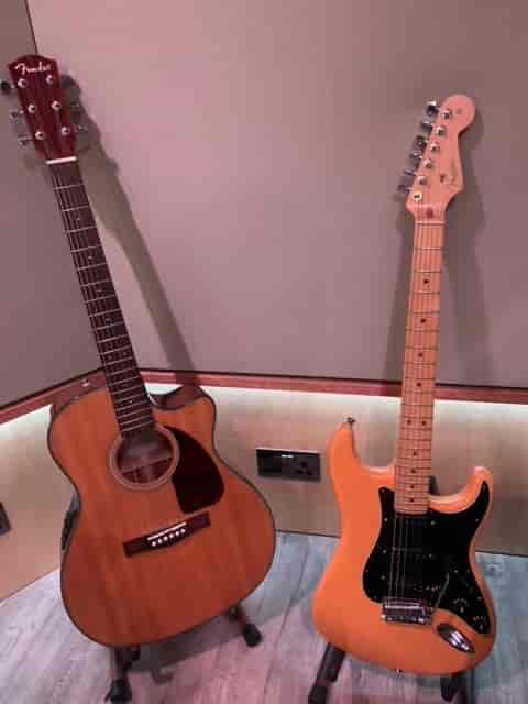 Guitars in creative space at Rollover Studios for events and collaboration.
