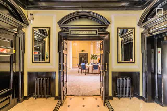 Elegant entrance with ornate decor at BMA House for corporate events and gatherings.