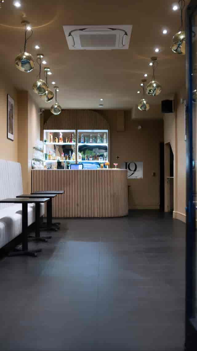 Modern bar area in Main Lounge, perfect for cocktail receptions and networking events.