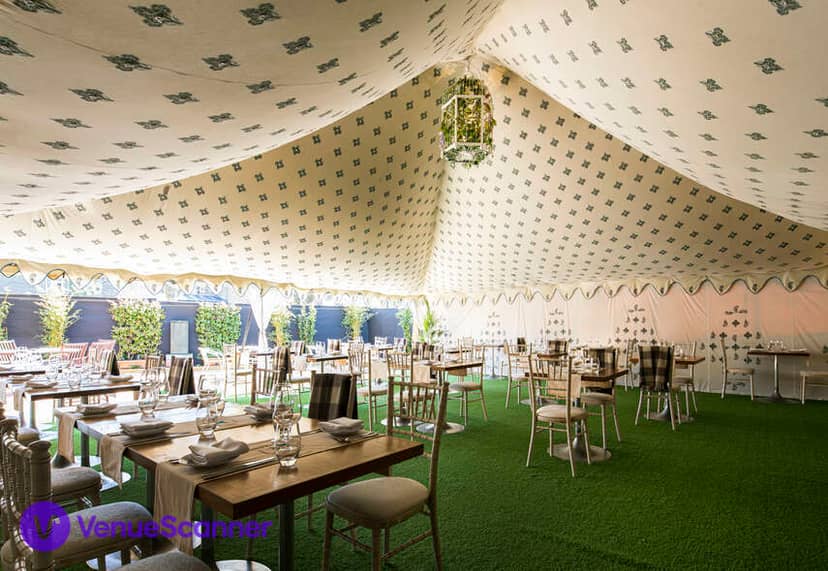 Elegant marquee setup with tables for weddings and corporate events in Babur.