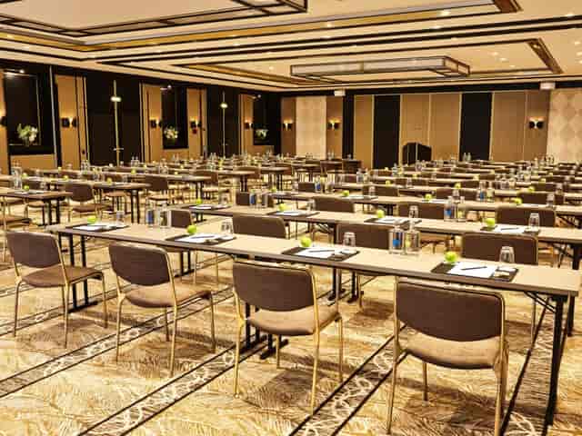 Ballroom 1 at Steigenberger Hotel, corporate event setup with modern decor and lighting.