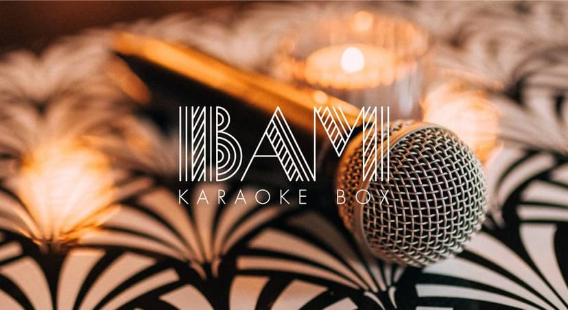 Stylish karaoke setup with microphone and ambient lighting for corporate events.