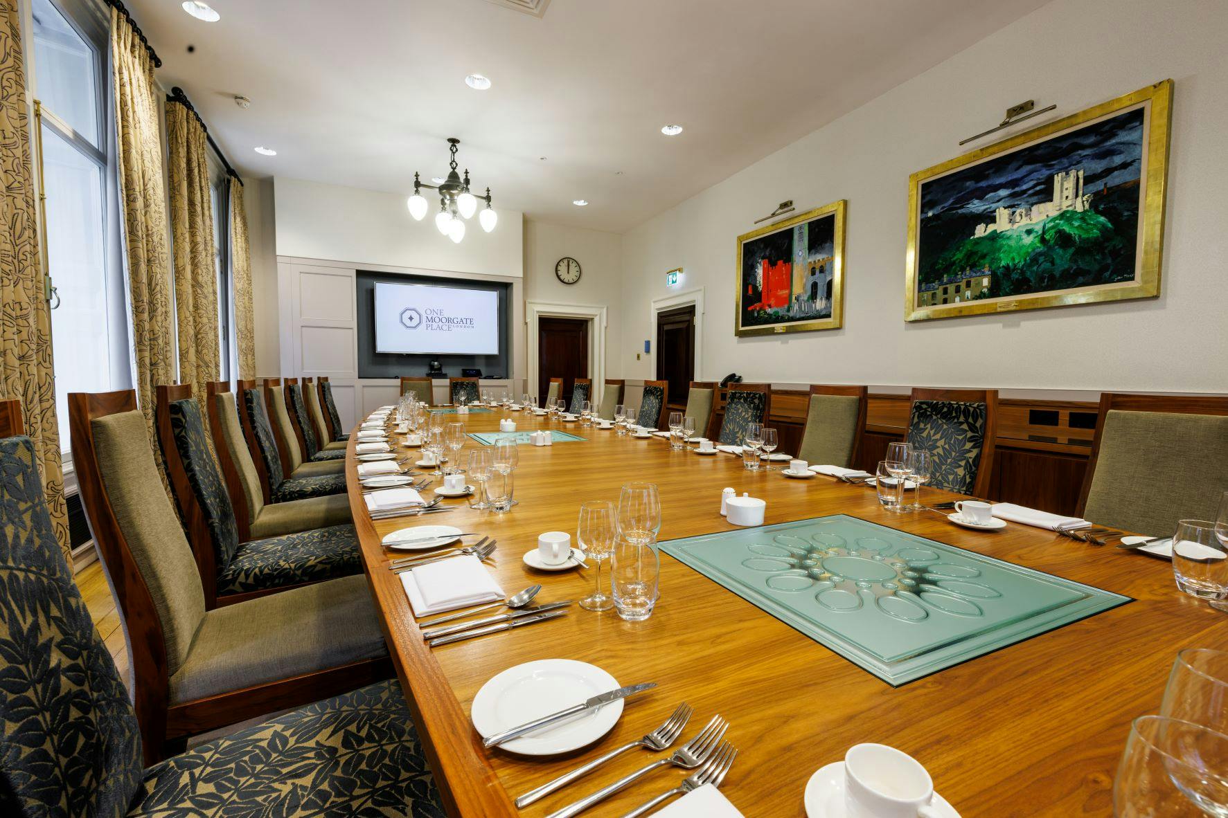 Boardroom at One Moorgate Place with elegant table setup for corporate meetings.