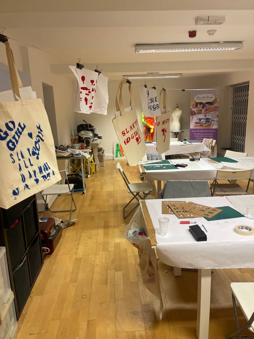 Creative workshop setup at Th Bop Hub with crafting materials for team-building events.