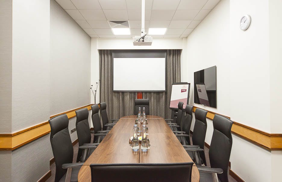 Meeting room 1 at Clayton Hotel Leeds with ergonomic chairs for corporate events.